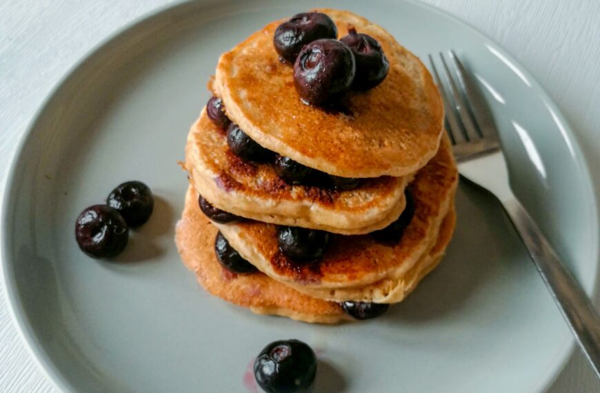 Apple & Peanut Butter Pancakes topped with blueberries