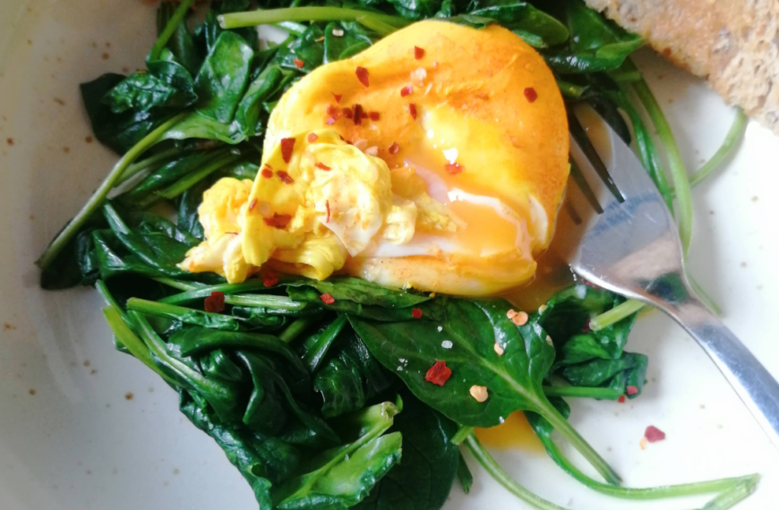 Turmeric poached eggs with spinach and toast