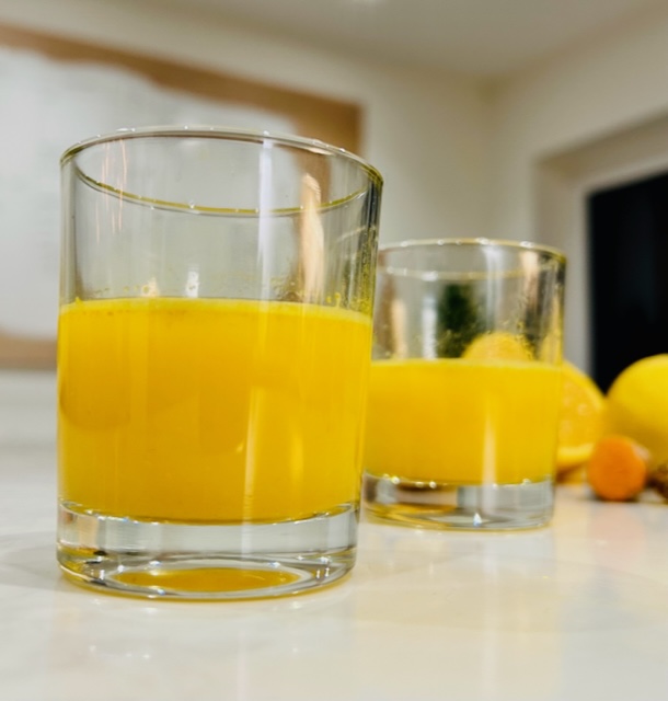 Orange and lemon ginger turmeric shot immune boost