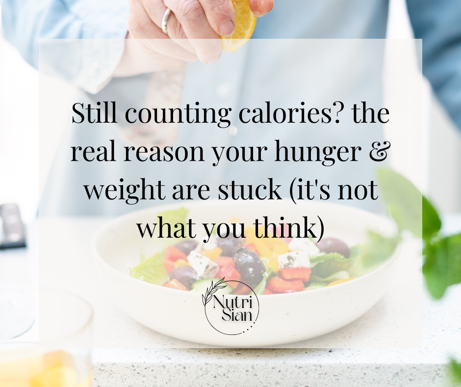 Close-up of a Sian squeezing lemon onto a colourful salad. Soft lighting, calm atmosphere.